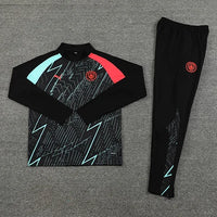 Manchester City 1/4 Zip Tracksuit - Black Lightning